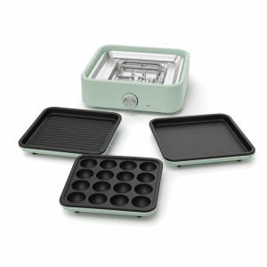 Multi Cooker in mint green with grill, flat, and takoyaki plates for tabletop cooking