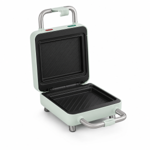 Sandwhich Maker in light mint green with detachable black plates and round silver handle
